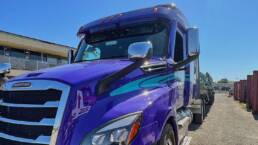 Flatbed CDL driver job in North Carolina securing a load