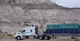 Cypress Truck Lines flatbed truck transporting building materials on trailer